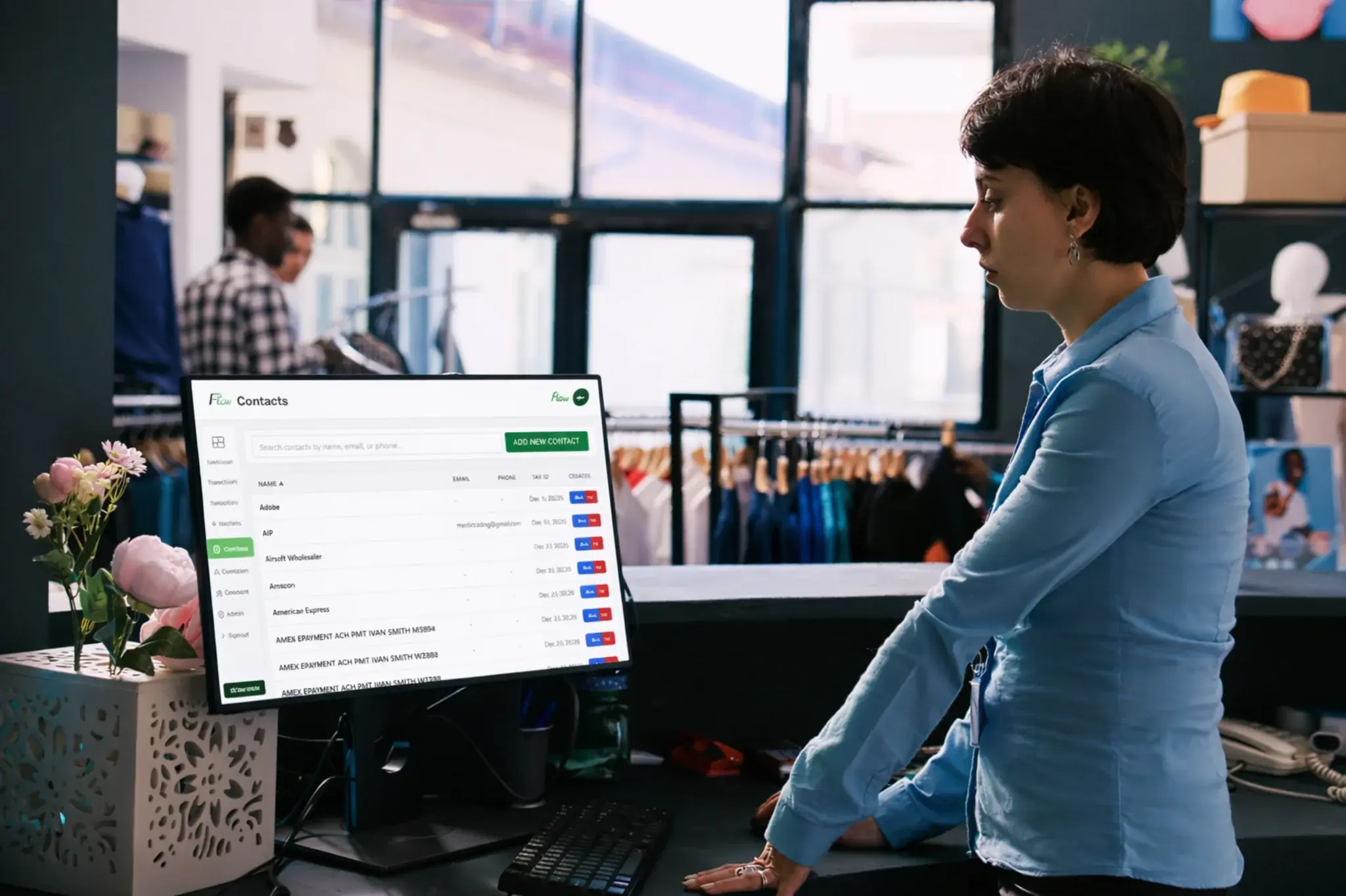 Retail business user reviewing contacts and customer data